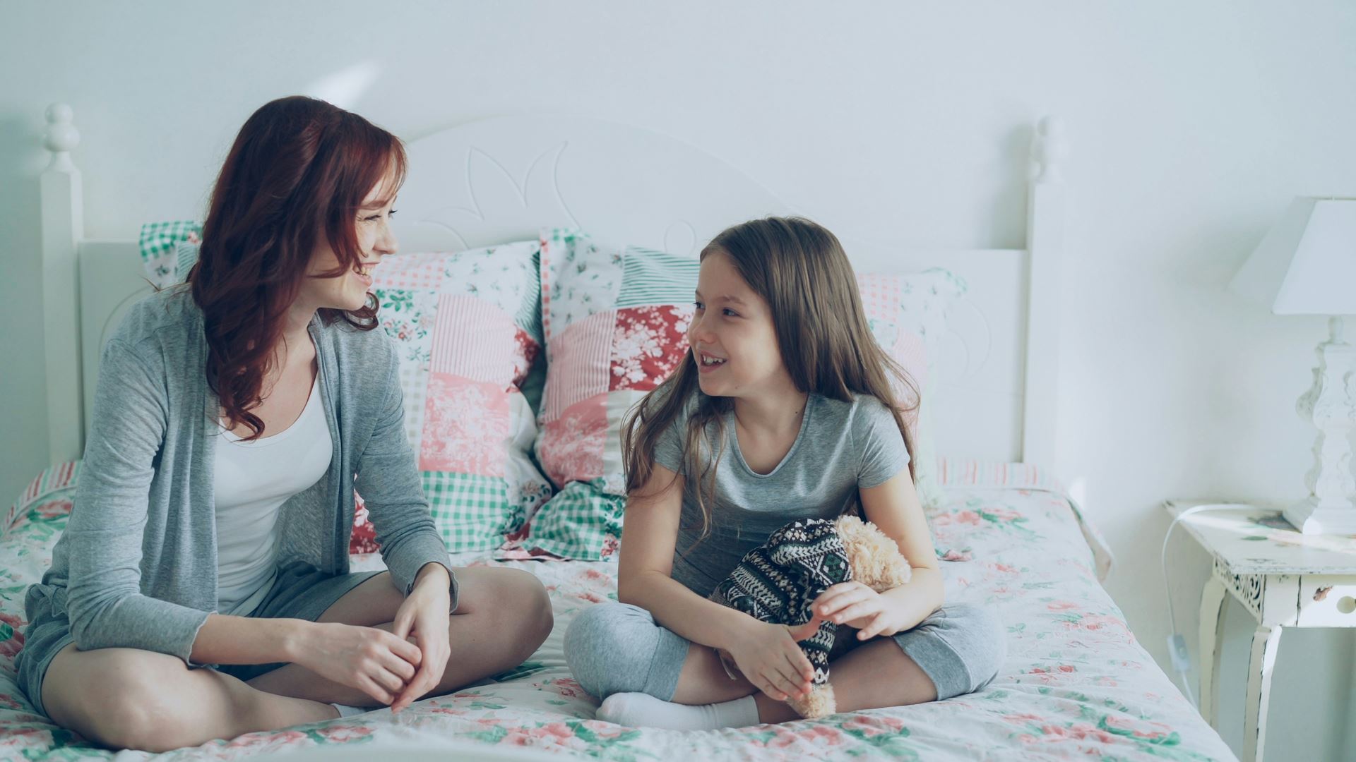 adult and child talking